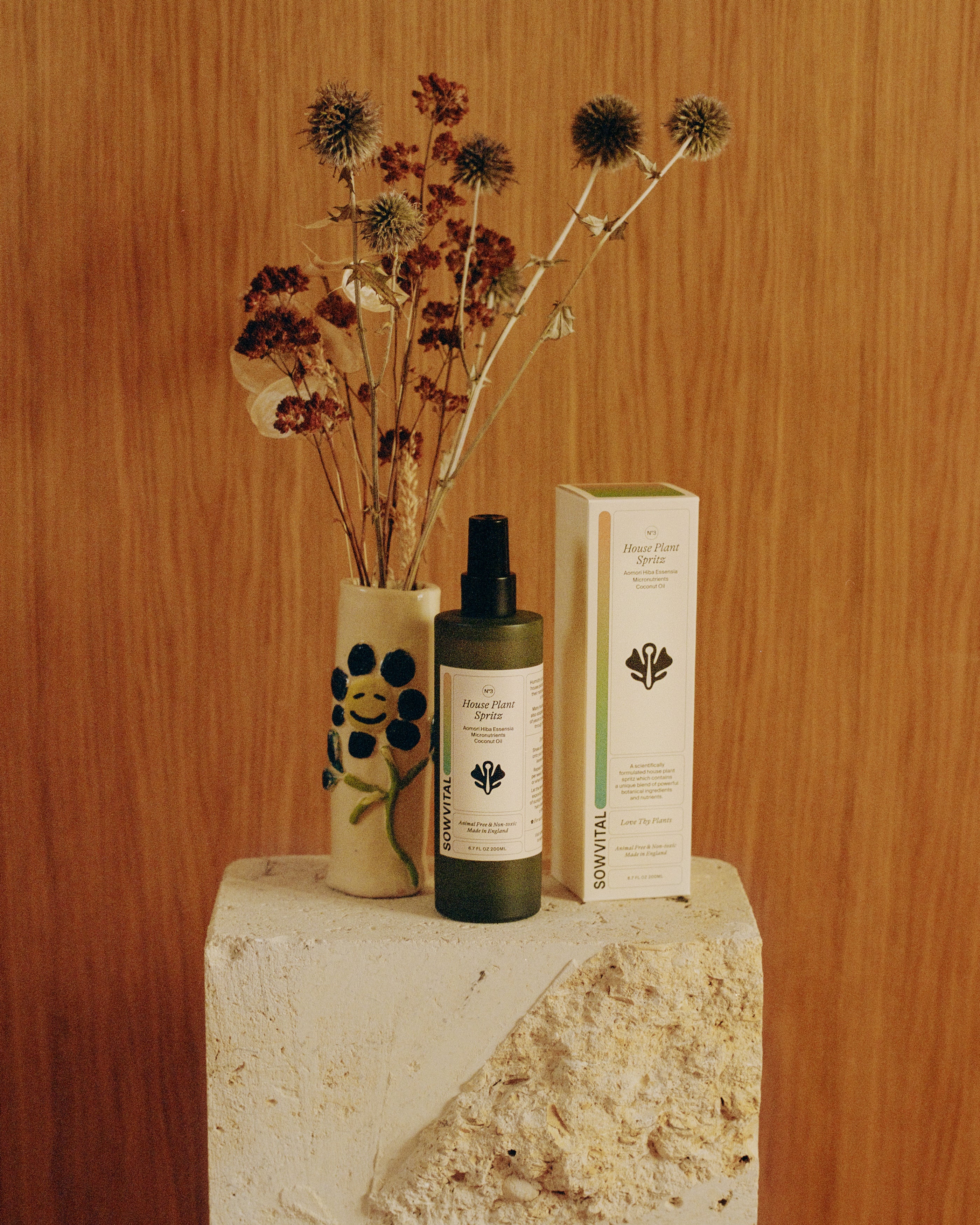 Leaf spray bottle for indoor plants showcased on a marble slab